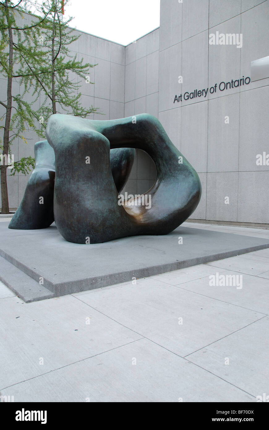 The well-known Henry Moore sculpture on permanent display outside the Art Gallery of Ontario in Toronto Ontario Canada Stock Photo