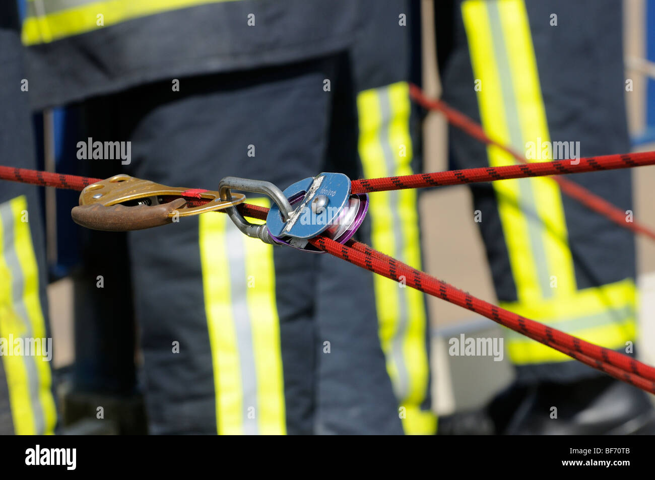 Rope pulley in use by fire service rope rescue team Stock Photo
