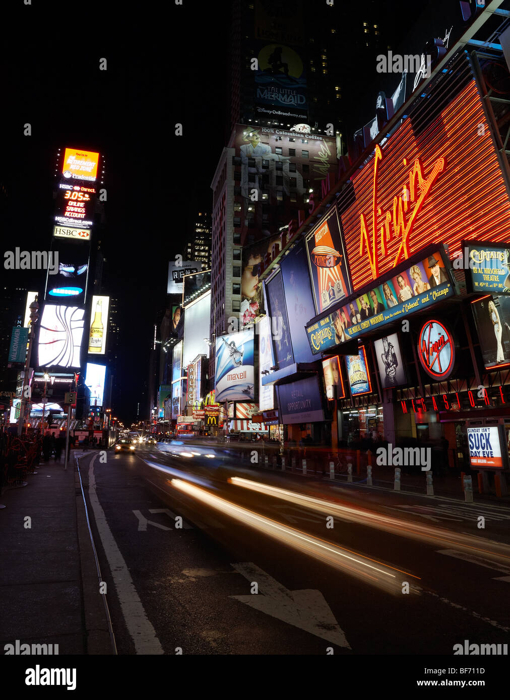 Night time at the bustling Times Square, New York. Stock Photo