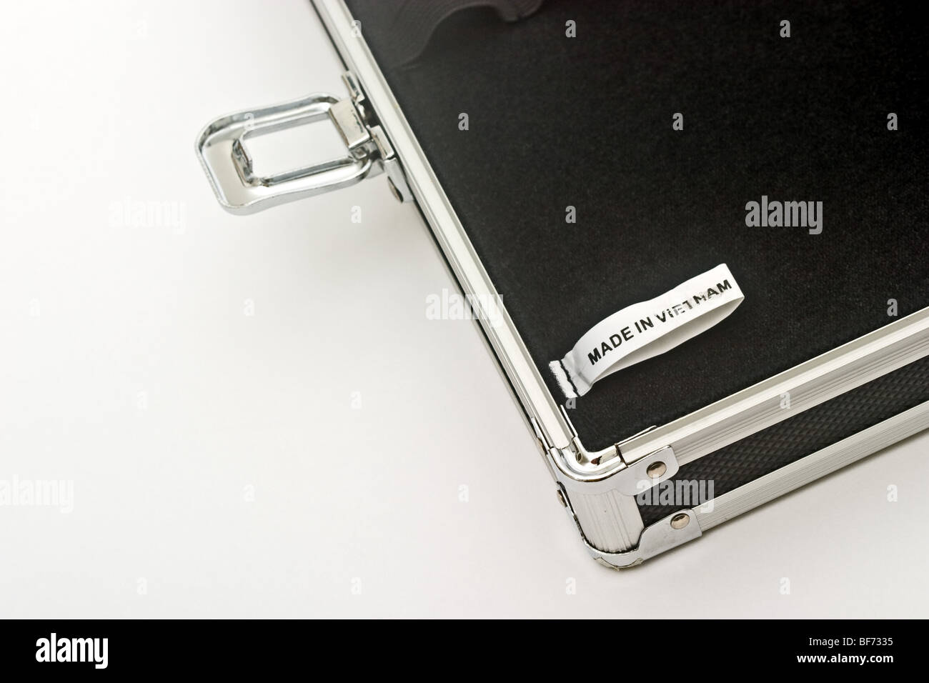 Small 'Made in Vietnam' tag inside a black case with silver latch Stock Photo