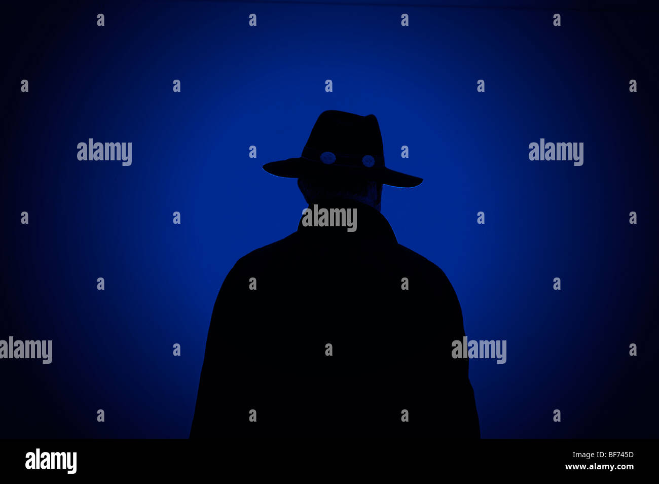 silhouetted man at night Stock Photo