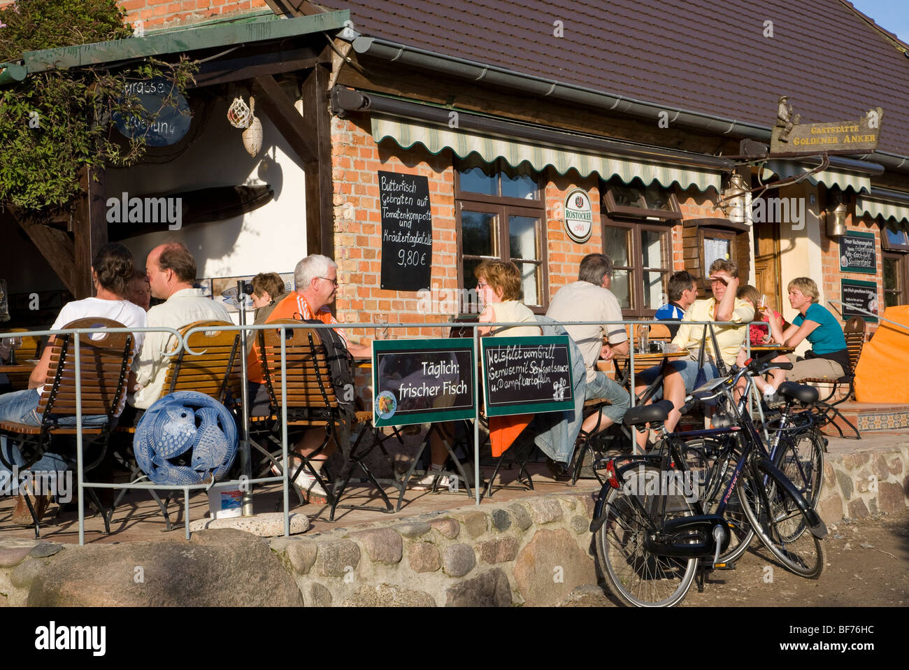 People at restaurant Goldener Anker in Vitt, Kap Arkona, Rugen island, Mecklenburg-Western Pomerania, Germany Stock Photo
