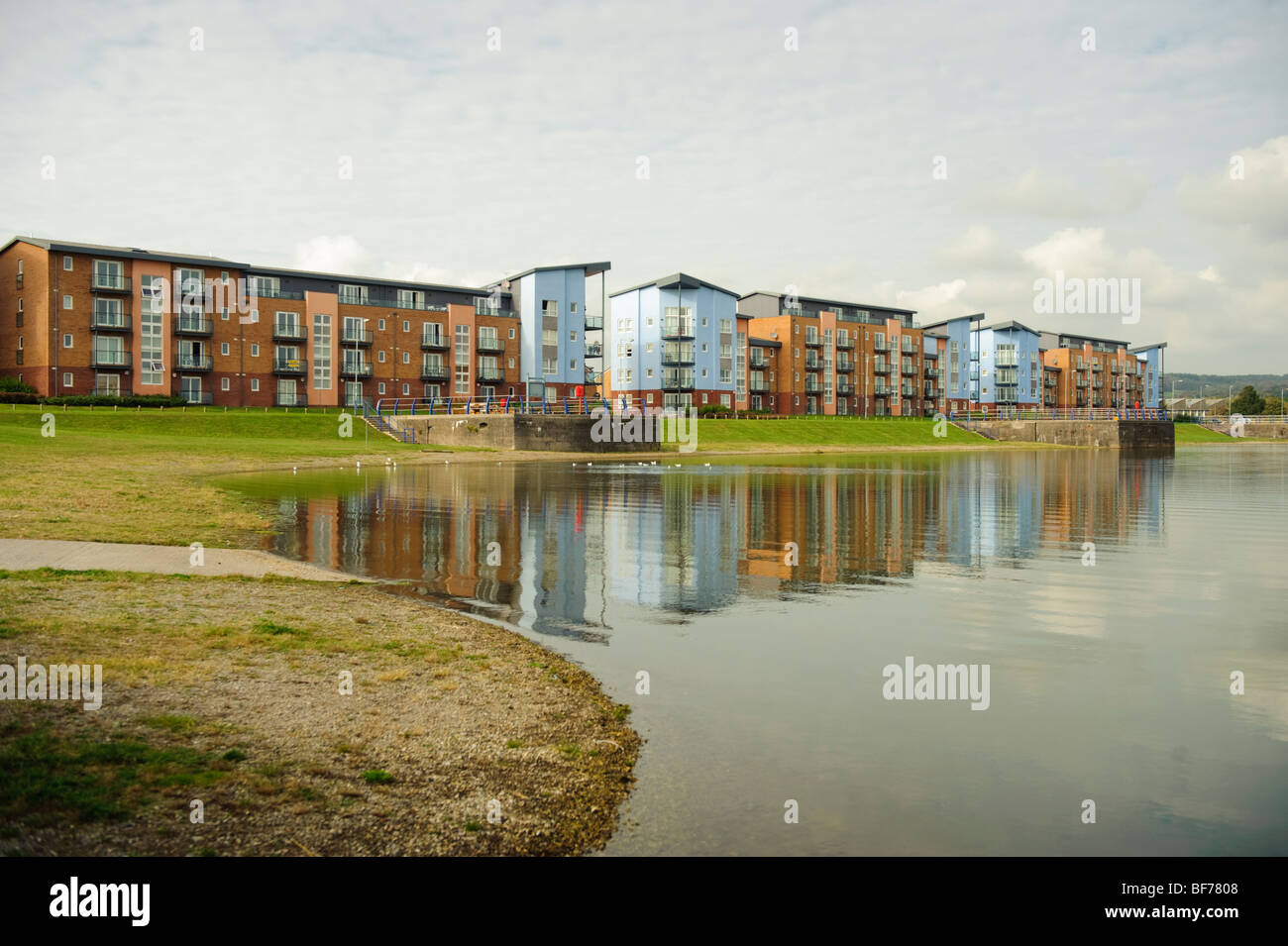 Blocks of waterside apartments in Llanelli millennium coastal park, Carmarthenshire, south west wales UK Stock Photo