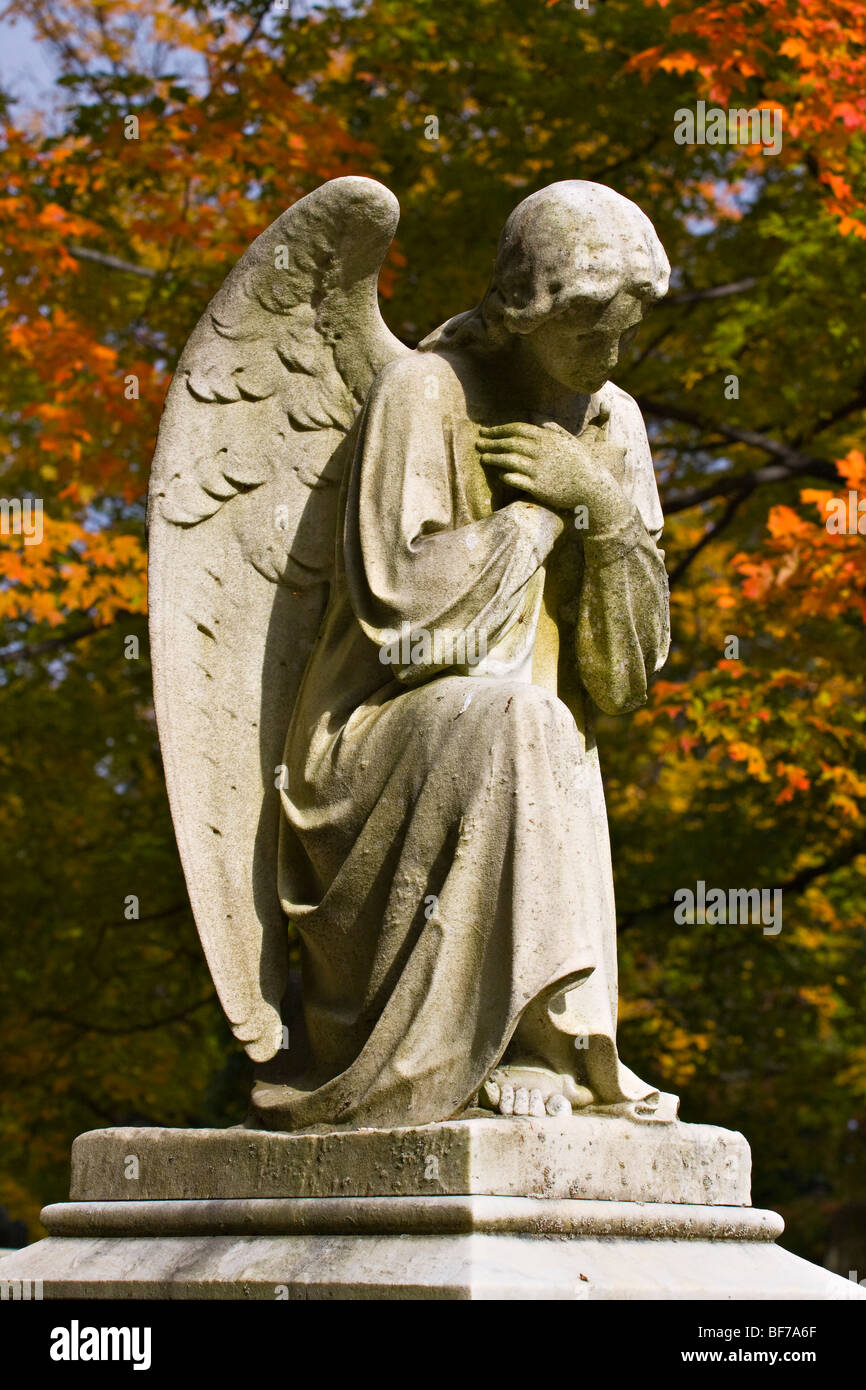 Forest Hills Cemetery.  Weathered Statue of an Angel. Stock Photo