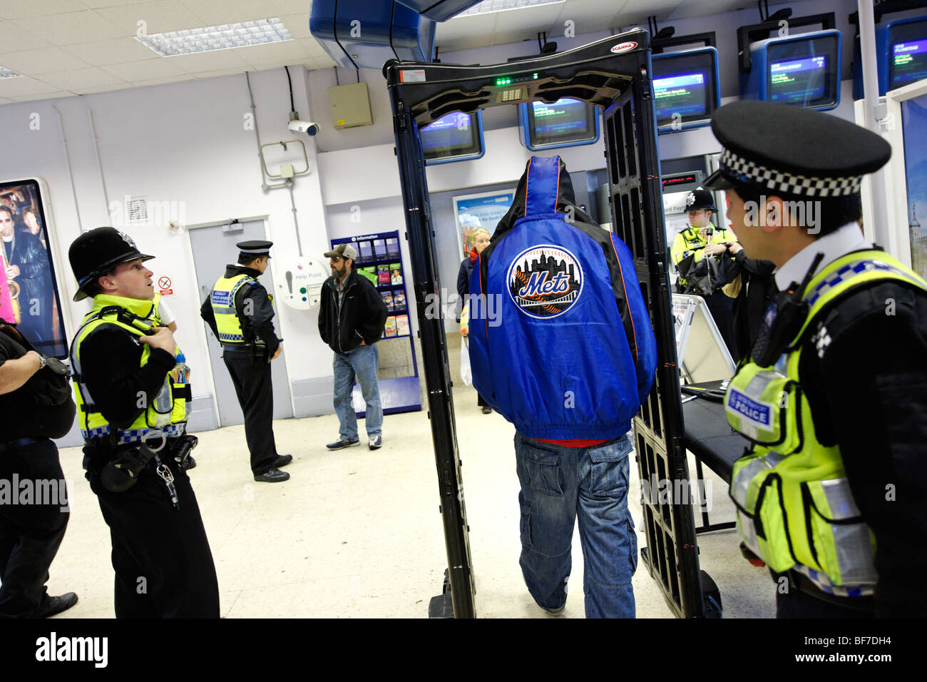 British Transport Police using the 'Knife Arch' detector during routine neighborhood policing at Lewisham train station. London Stock Photo