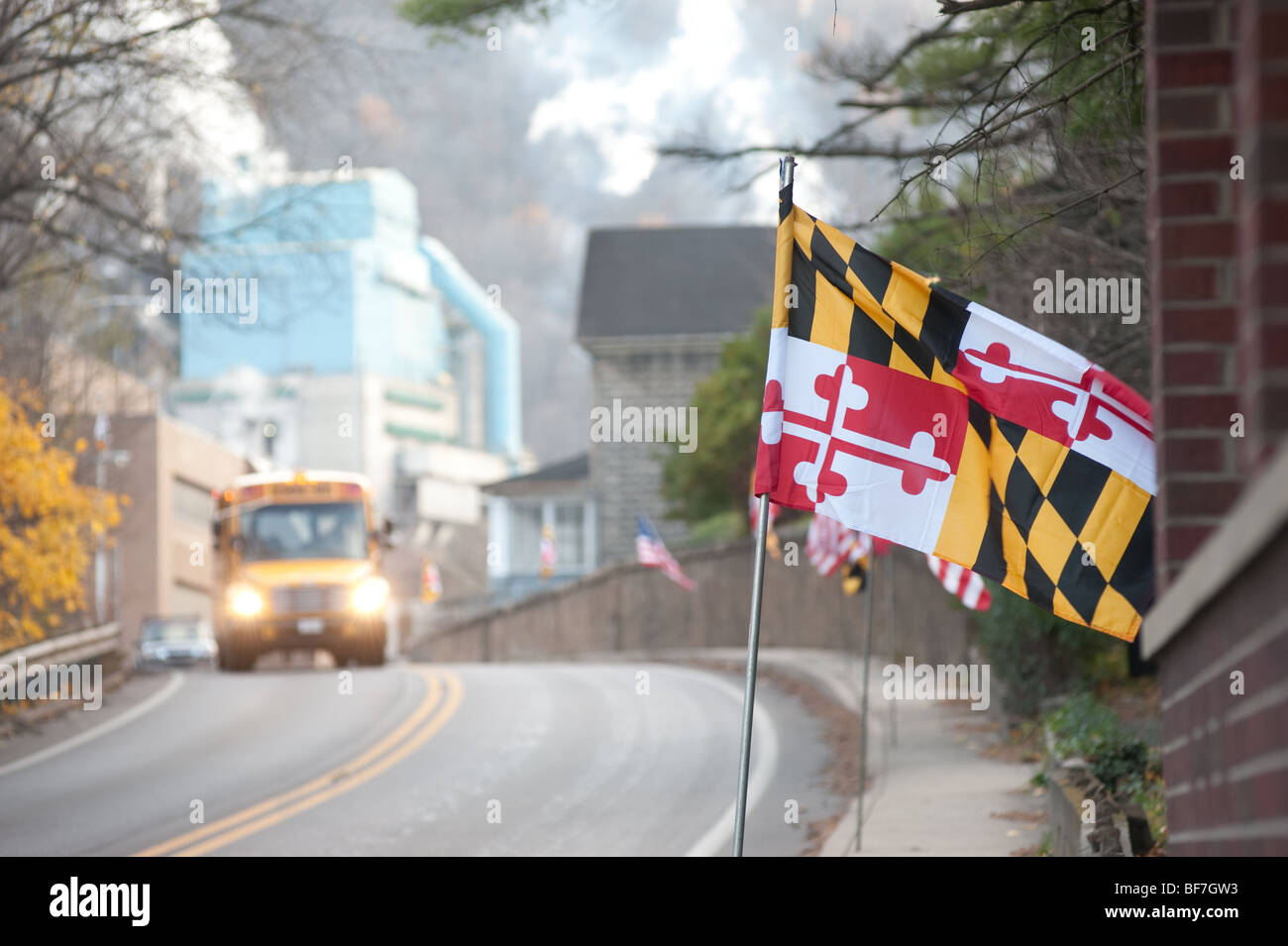 Maryland flag in front of Luke Maryland paper mill Stock Photo Alamy