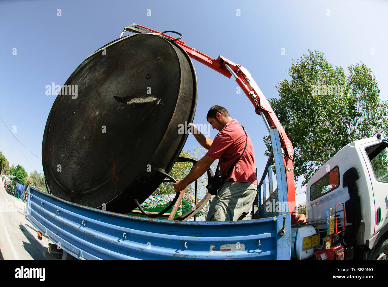 giant Paella pan is loaded onto small lorry Stock Photo Alamy