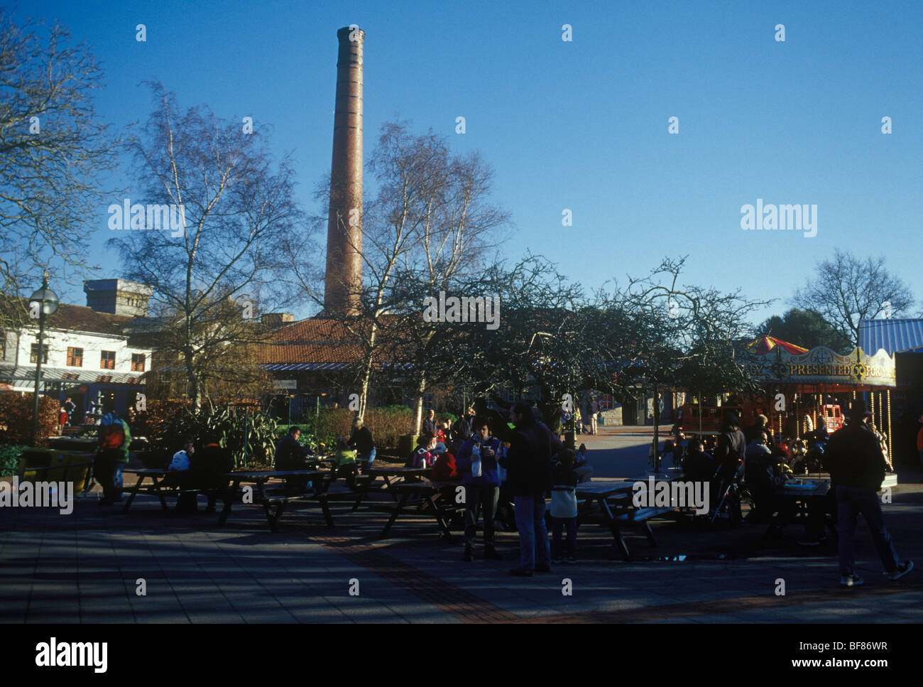 Street Somerset UK. Clarks Shopping Village on site of former shoe factory  tall chimney outlet stores Stock Photo - Alamy