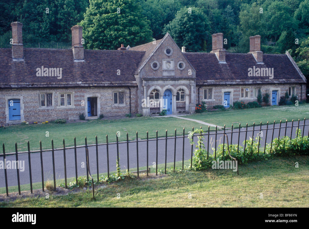 Milton Abbas Dorset UK 1674 almshouses rebuilt in resited model village