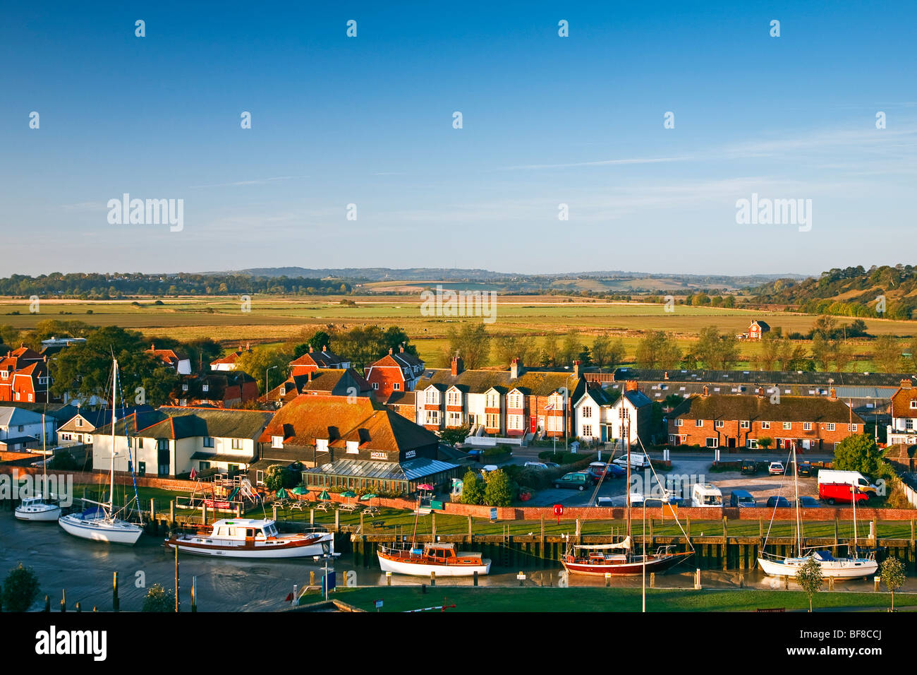 An evening view of Strand Quay and the Sussex countryside beyond from Rye, East Sussex, England, UK 2009 Stock Photo