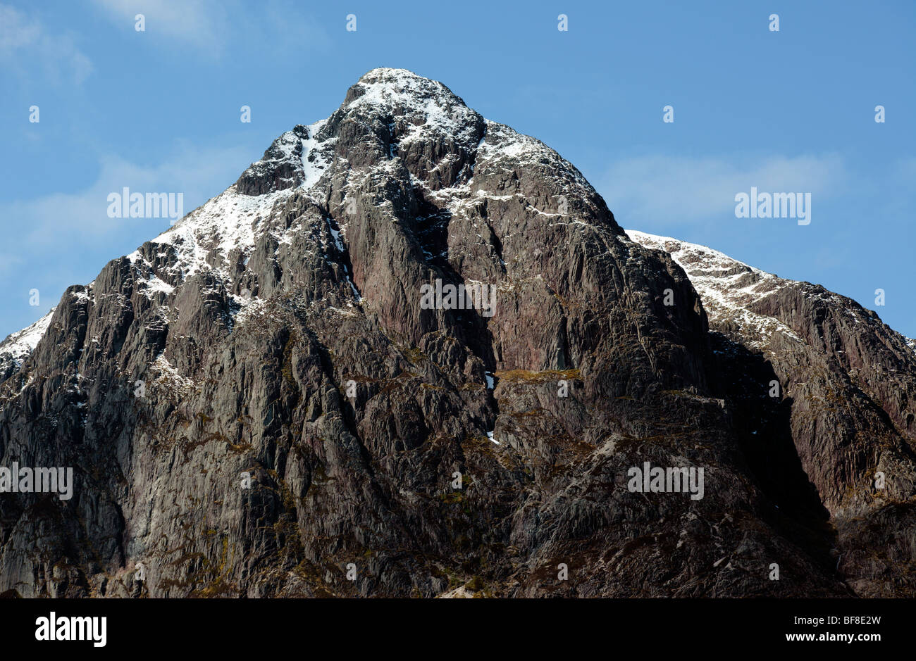 Scottish mountains in spring snow in May - Buachaille Etive Mhor Glencoe Scotland UK Stock Photo