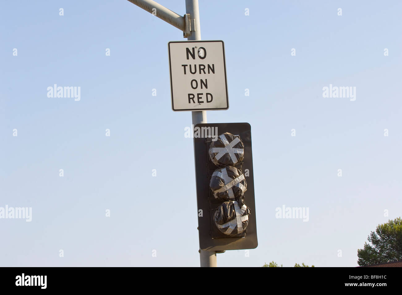 Description field: this traffic signal in Orange County, California is covered up before it is put into service. Stock Photo