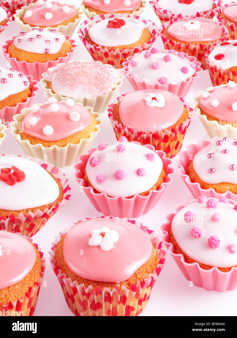 PINK AND WHITE CUPCAKES OR FAIRY CAKES Stock Photo