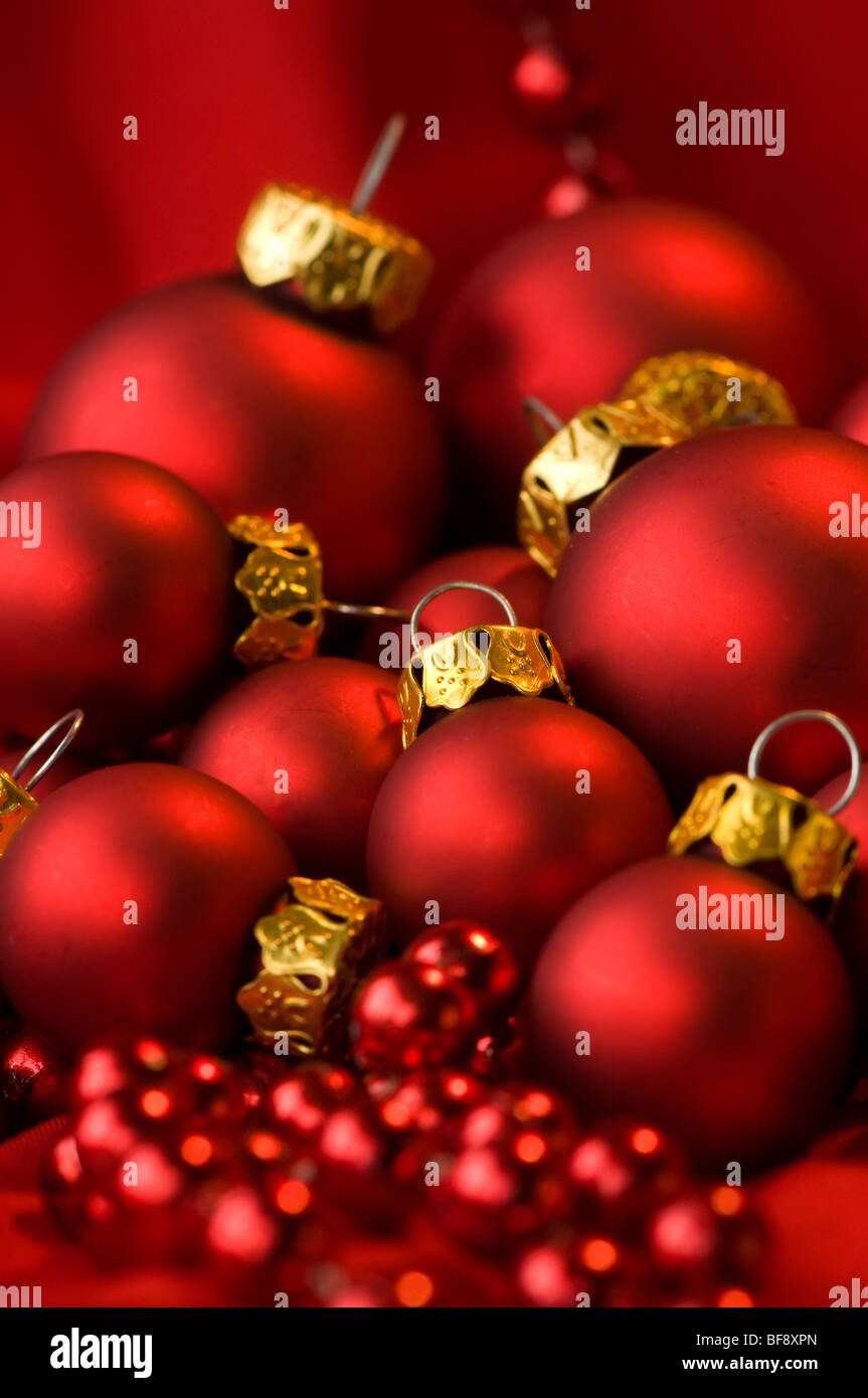 Red and gold Christmas baubles with red beads Stock Photo