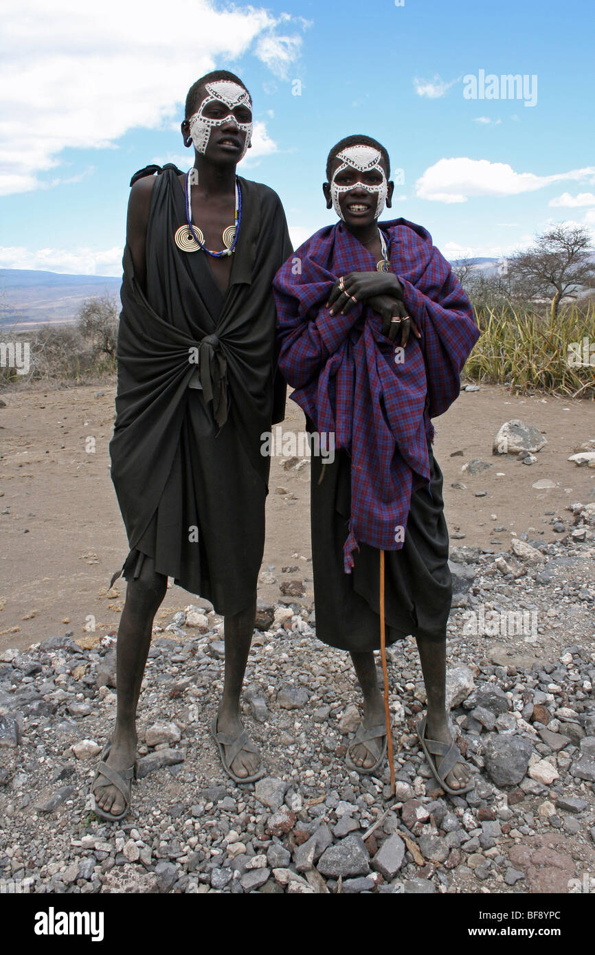 Young Masai Boys With Painted Faces After Their Circumsion Ritual Near Ngorongoro Crater, Rift Valley, Tanzania Stock Photo