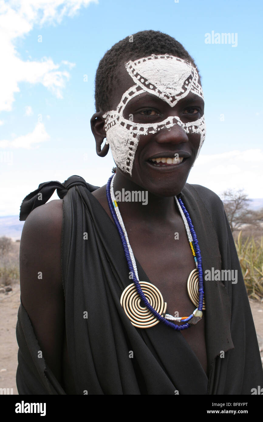 Young Masai Boy With Painted Faces After Their Circumsion Ritual Near Ngorongoro Crater, Rift Valley, Tanzania Stock Photo