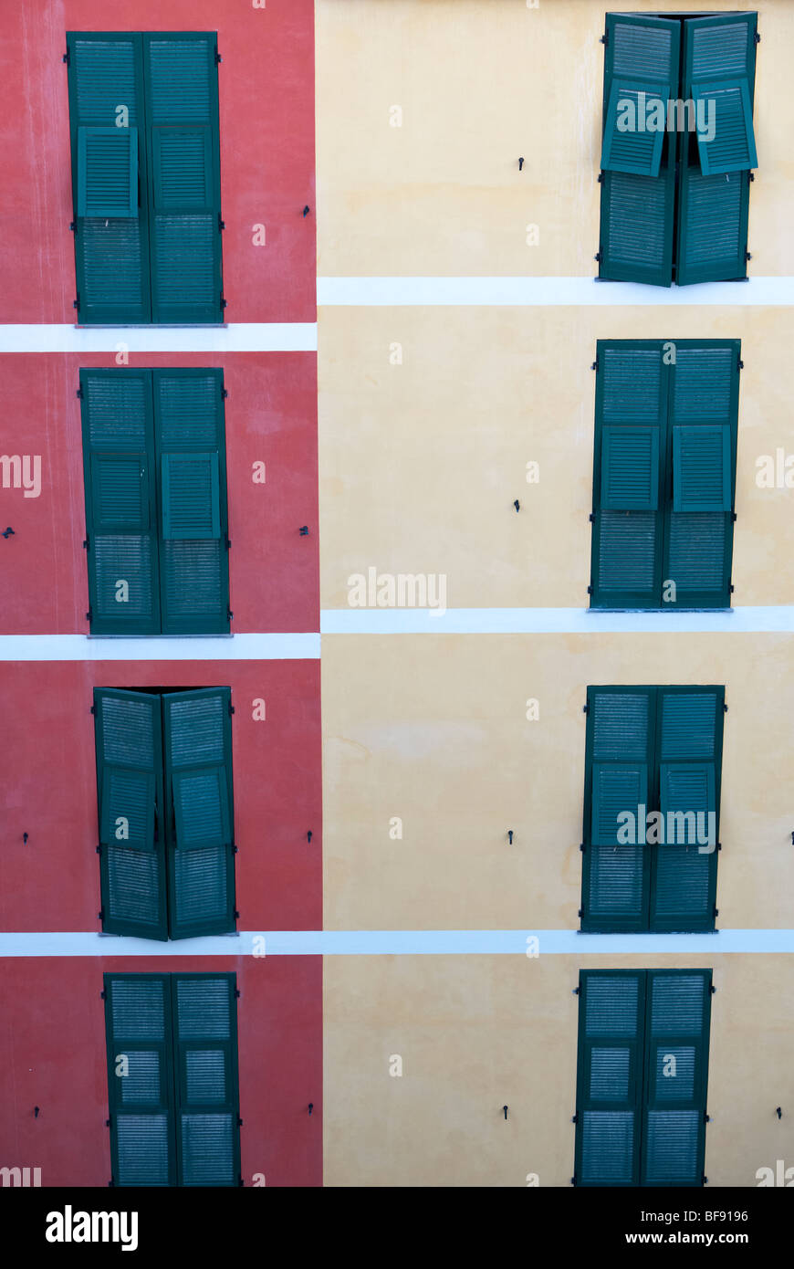 Green shutters and coloured buildings, Genoa, Italy Stock Photo