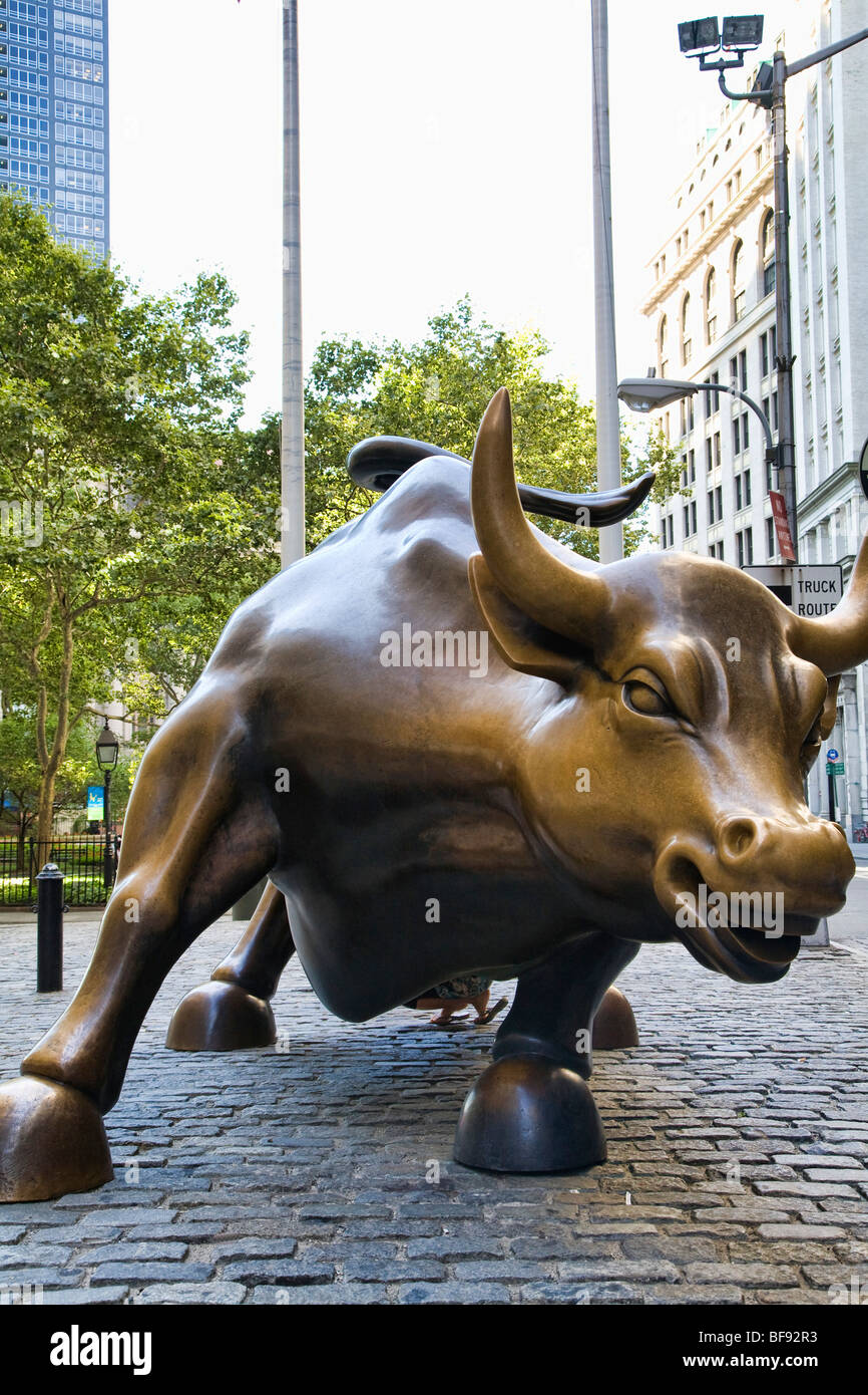 The Merrill Lynch bull in Lower Manhattan, New York, stands as a symbol of financial and market optimism. Stock Photo