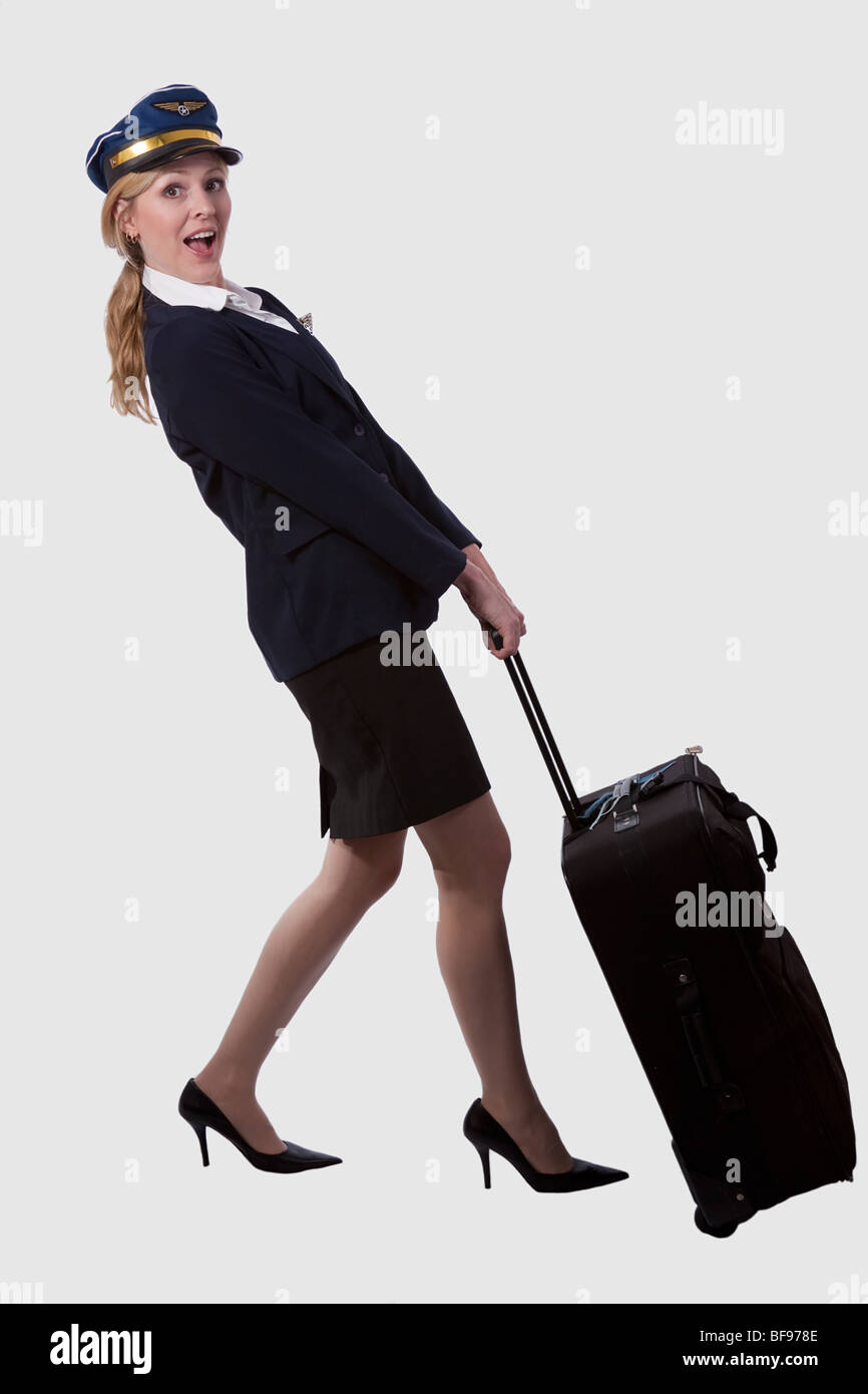Pulling heavy luggage Stock Photo Alamy