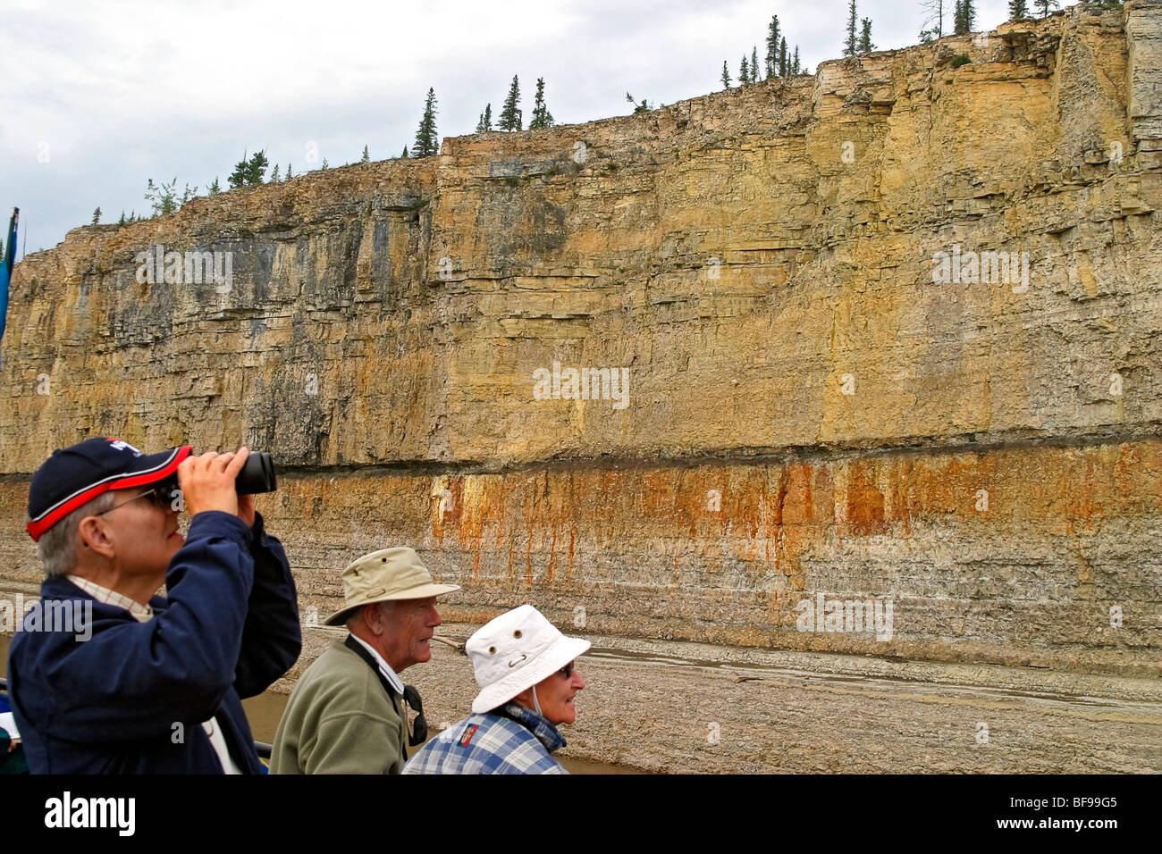 people-look-at-the-ramparts-100-200-foot-tall-wall-of-limestone-along