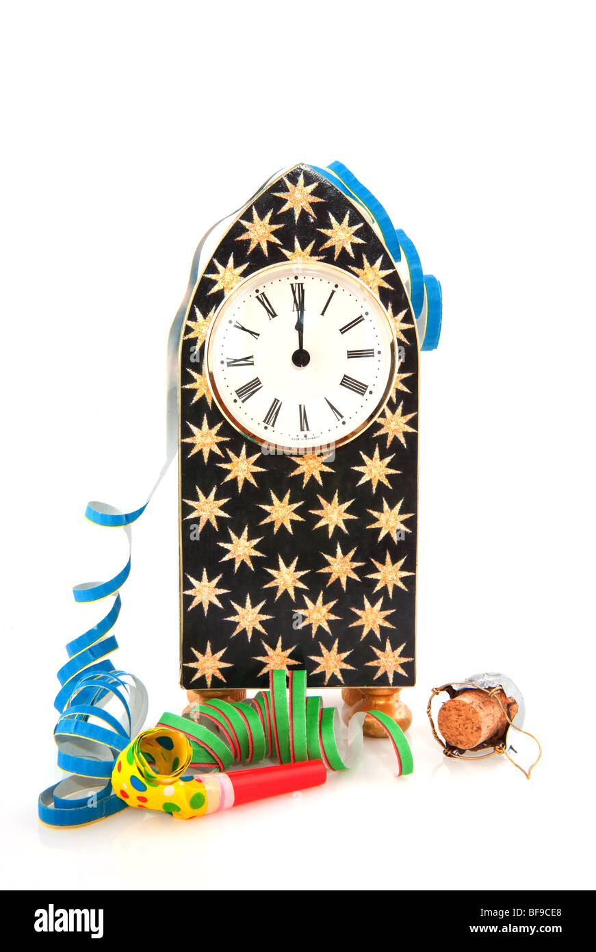 Twelve O'Clock with fireworks at new years eve Stock Photo