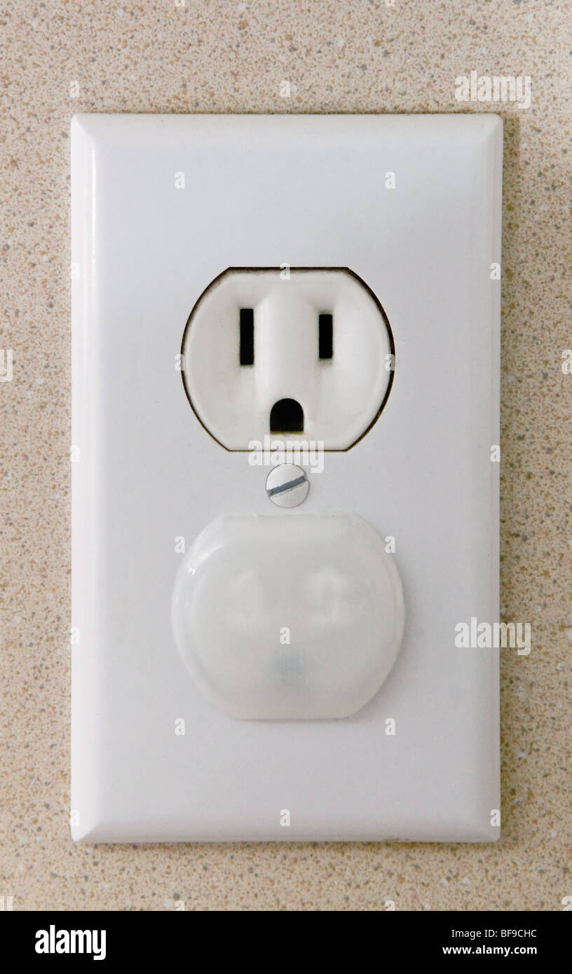 A simple childproof plug protector is mounted in half of a dual 110