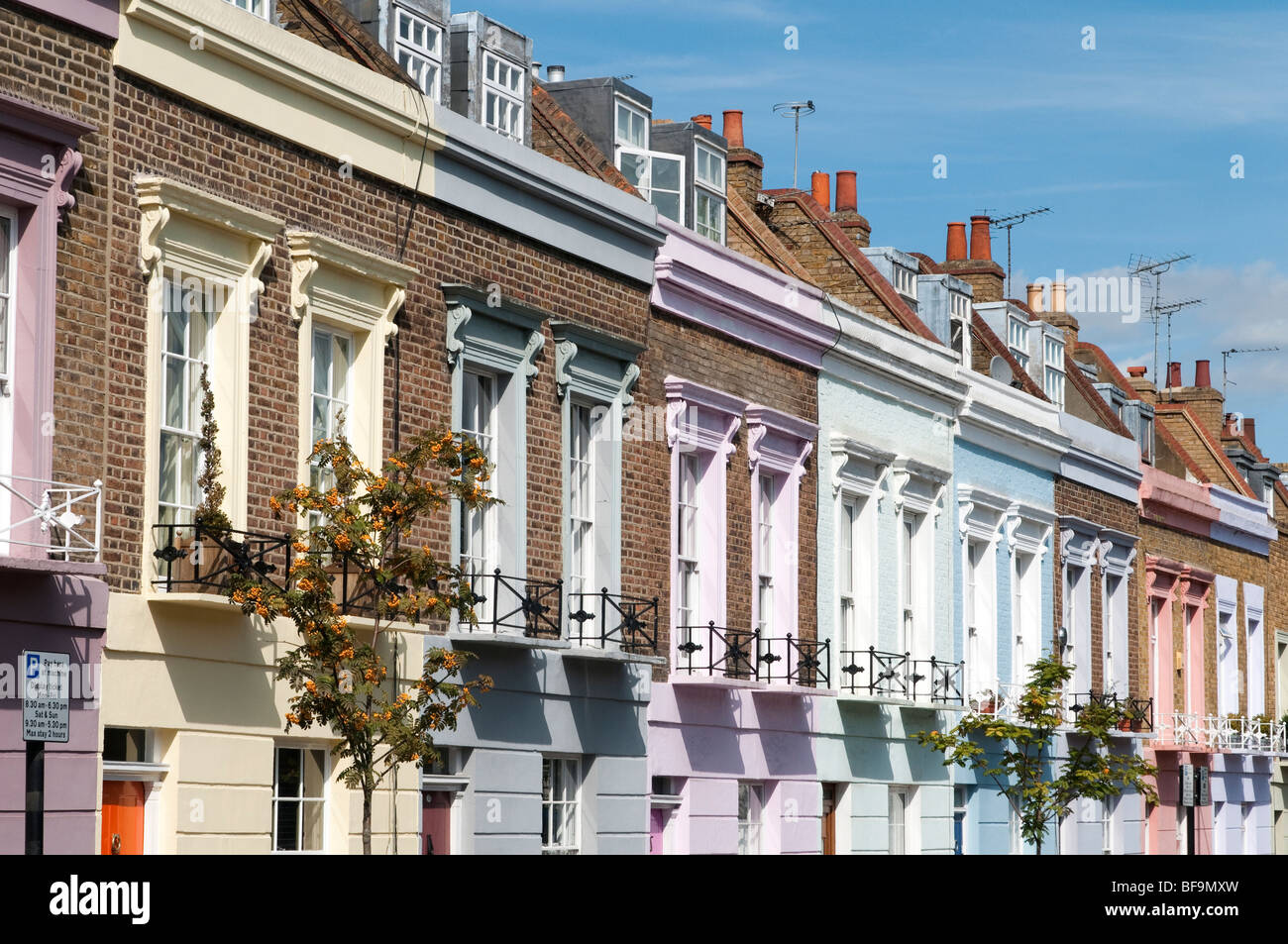 Colourful terraced houses on Hartland Road in Camden, London, England, UK Stock Photo
