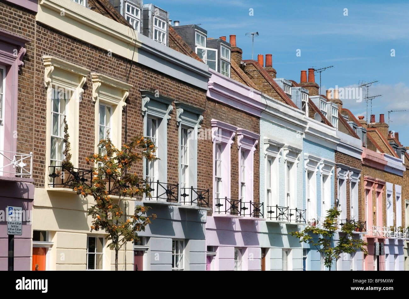 Colourful terraced houses on Hartland Road in Camden, London, England