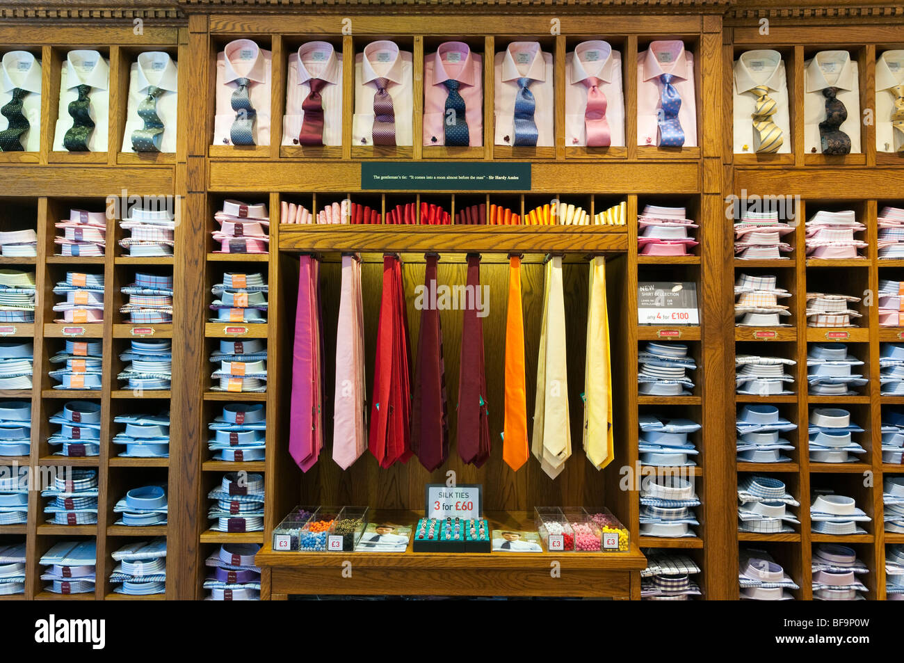 Men's shirts and ties on shelves in T.M. Lewin clothes shop, London,  England, Britain, UK Stock Photo - Alamy
