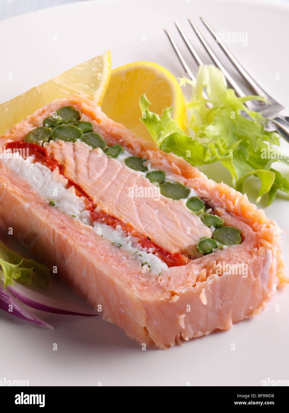 A slice of salmon terrine individual portion Stock Photo Alamy