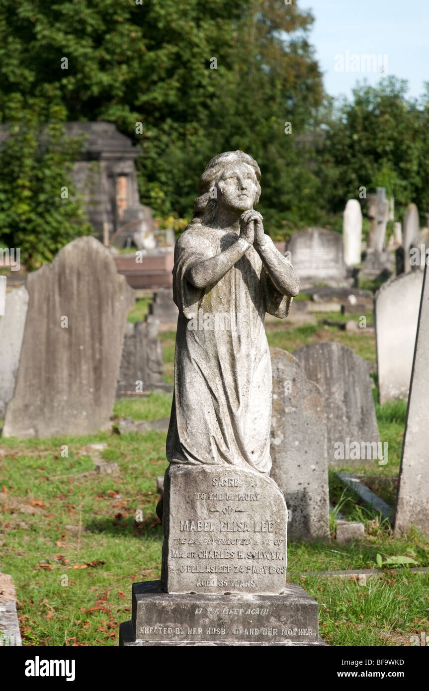 Statue on grave in Kensal Green Cemetery, London, UK Stock Photo
