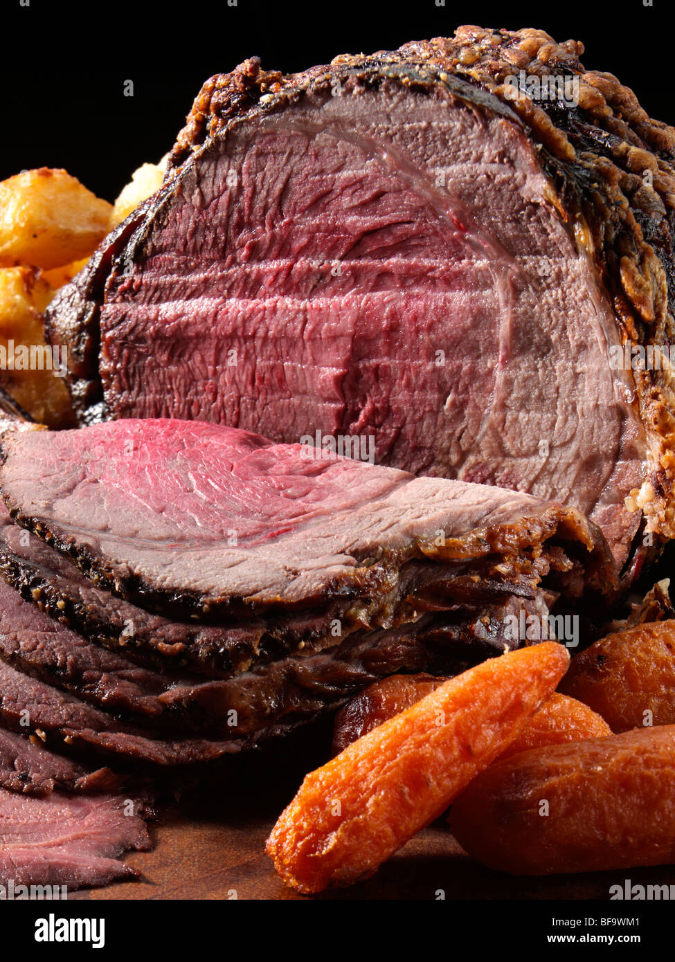 Irish roast beef joint with vegetables Stock Photo Alamy