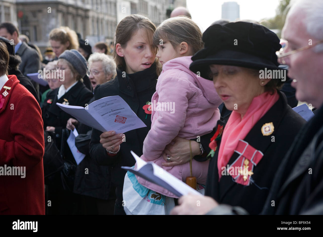 War widows and friends gather at The Cenotaph in London in the annual act of Remembrance for those killed in Wars Stock Photo