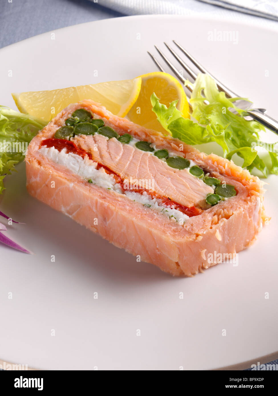 A slice of salmon terrine individual portion Stock Photo Alamy