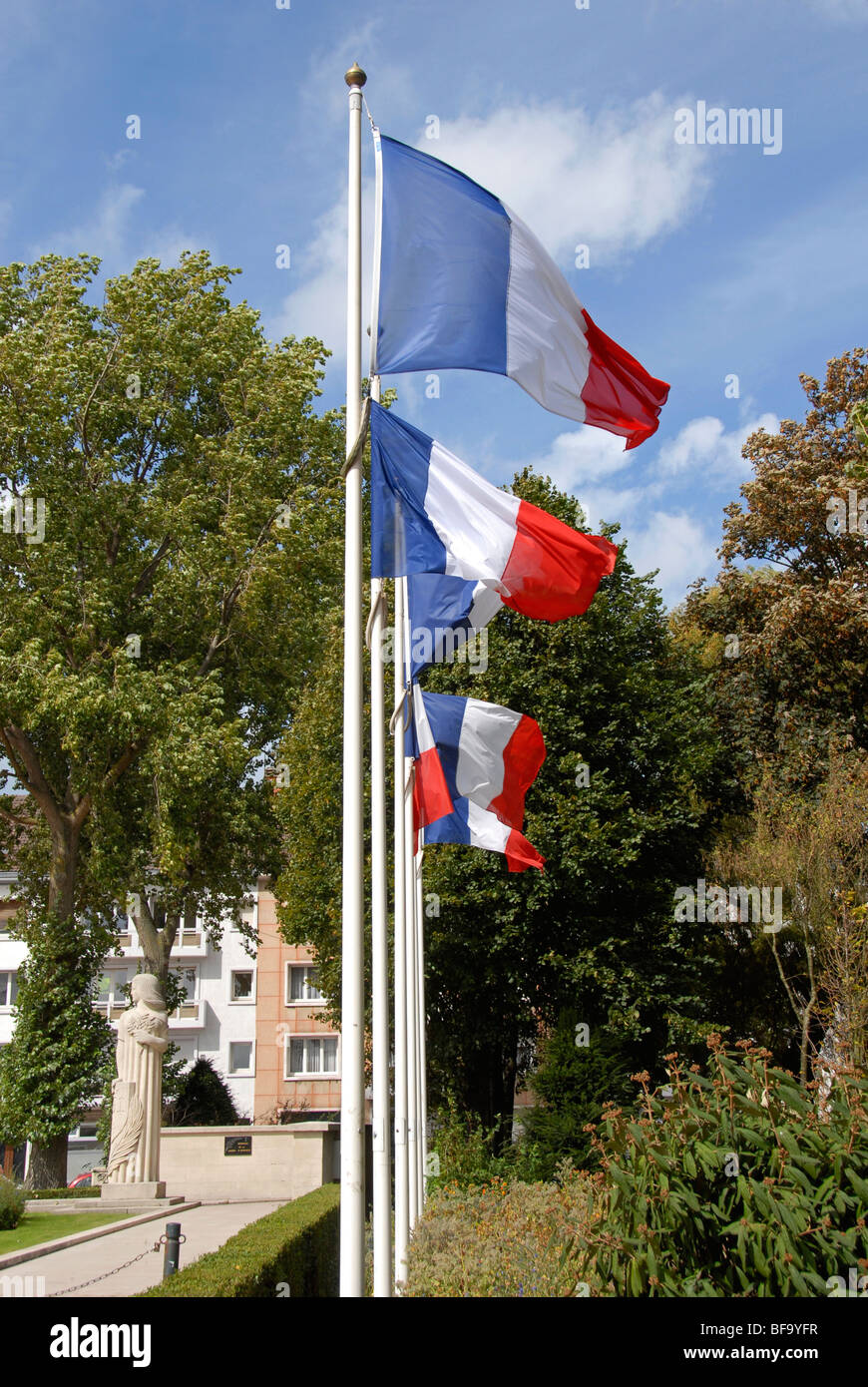 French flags blowing in the breeze Stock Photo
