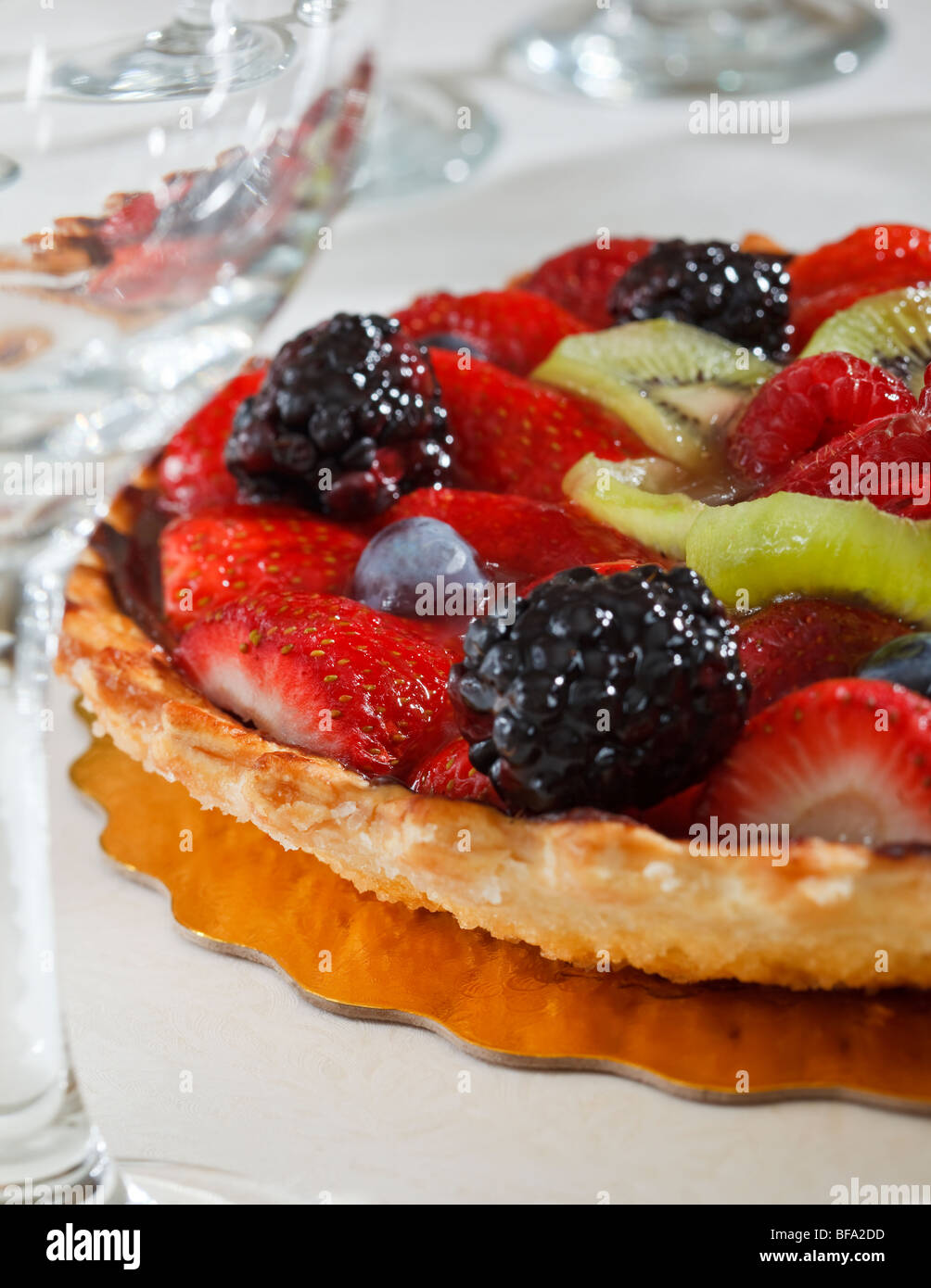 Close up of Fruit Torte with Strawberries, Boysenberries, Kiwi and Grapes. Stock Photo