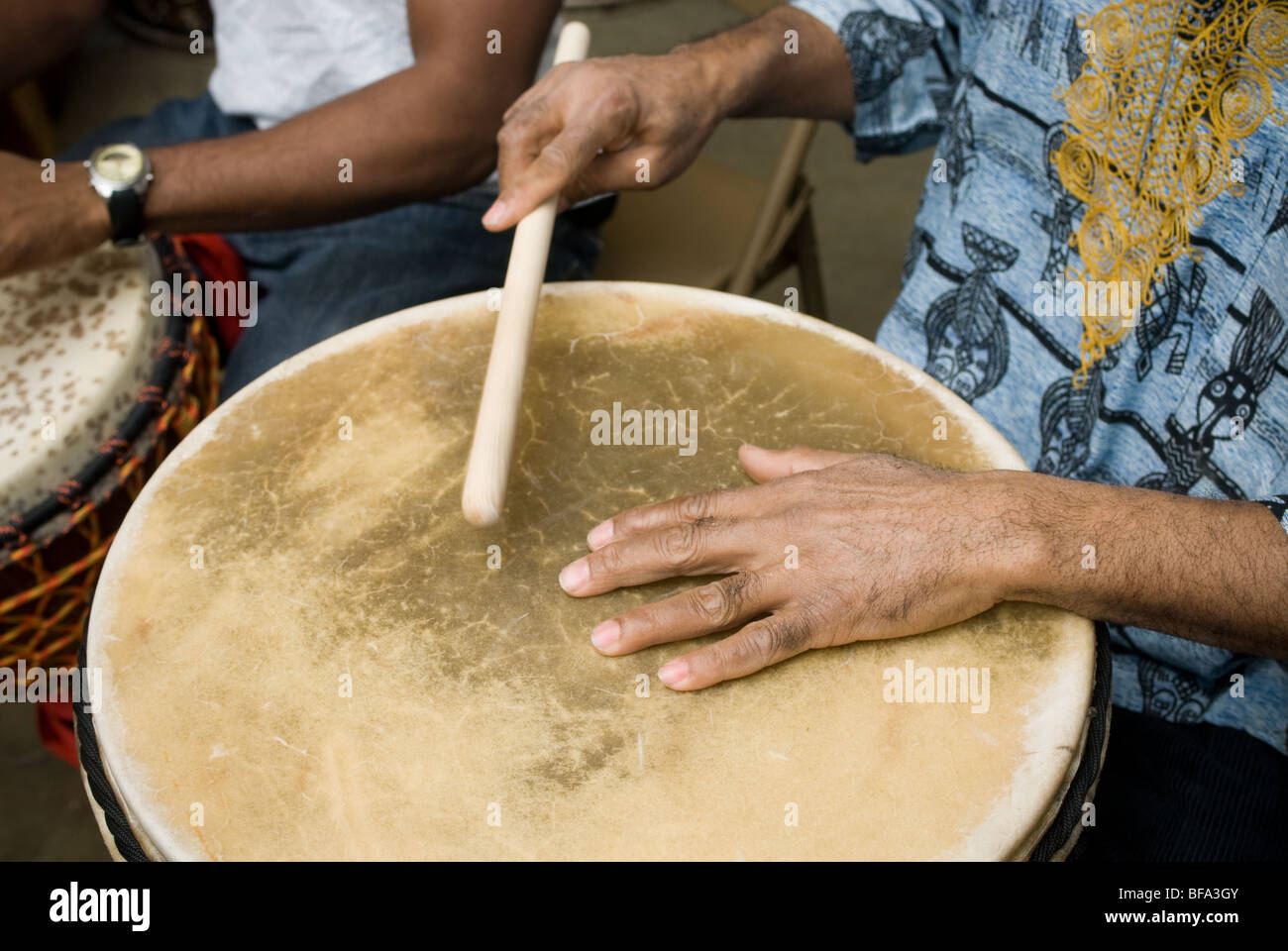 African american man playing african drum Stock Photo