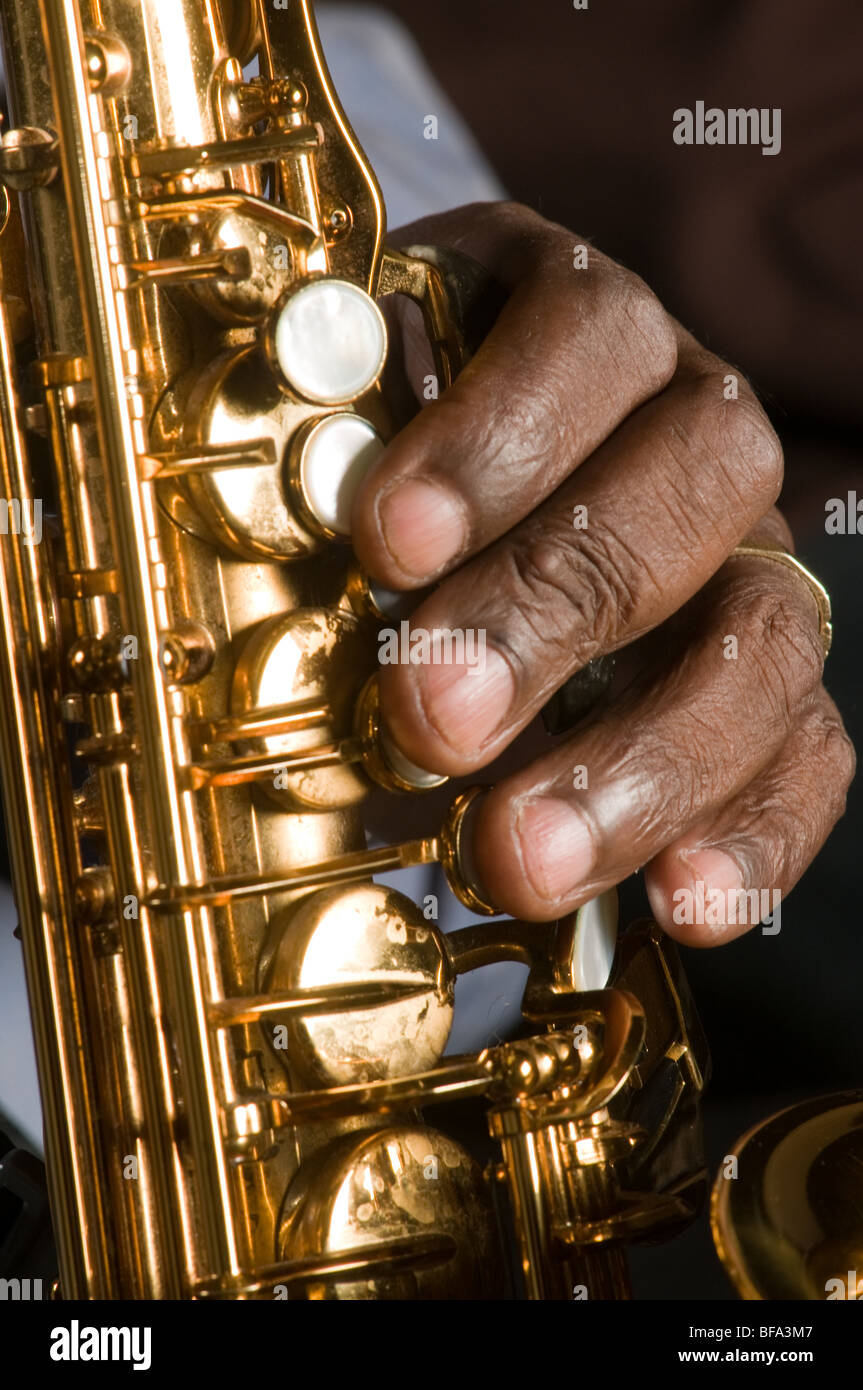 fingers on saxophone keys Stock Photo Alamy