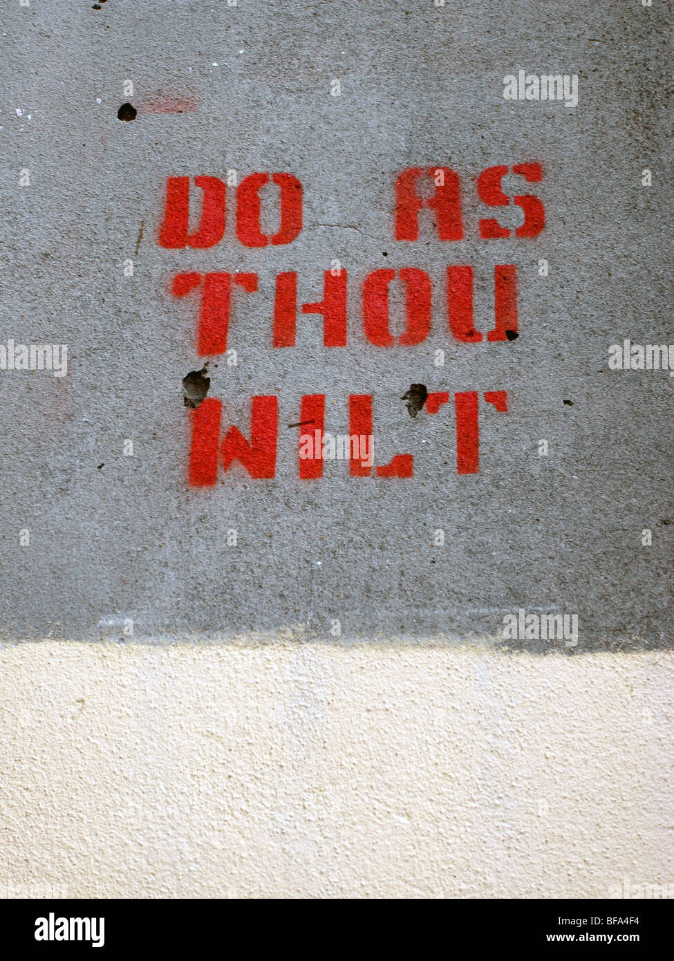 Do as thou wilt - graffiti stencil on wall, Erskineville, Sydney, Australia. No PR Stock Photo