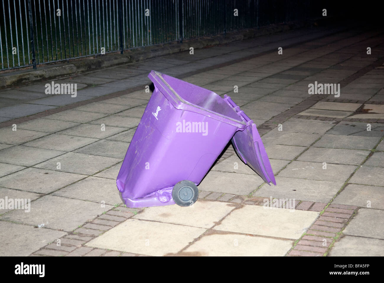 Melted purple plastic Wheelie bin on fire Stock Photo Alamy