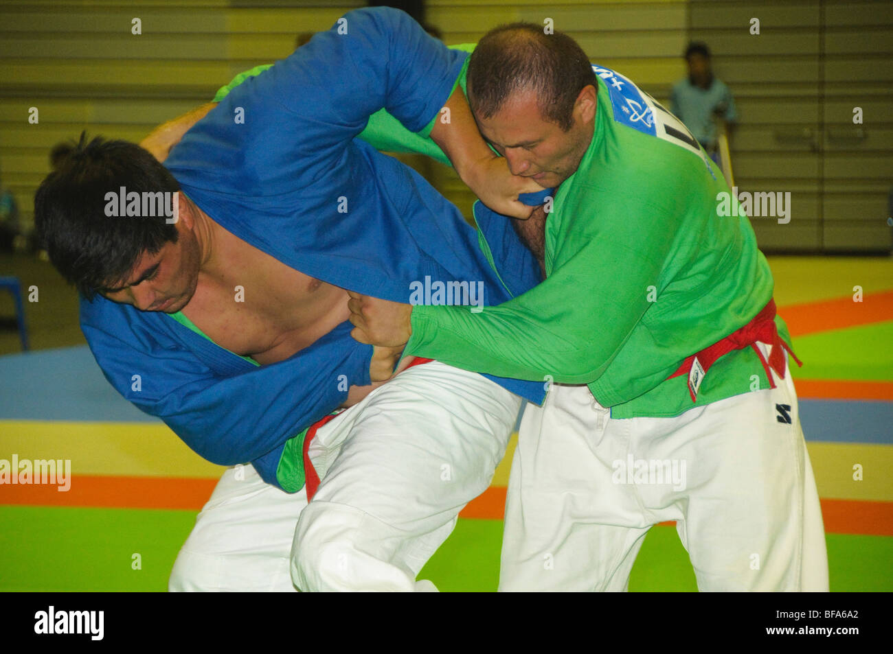 Kurash Uzbeki jacket wrestling action at the SE Asian Martial Arts Championships in Bangkok Thailand Stock Photo