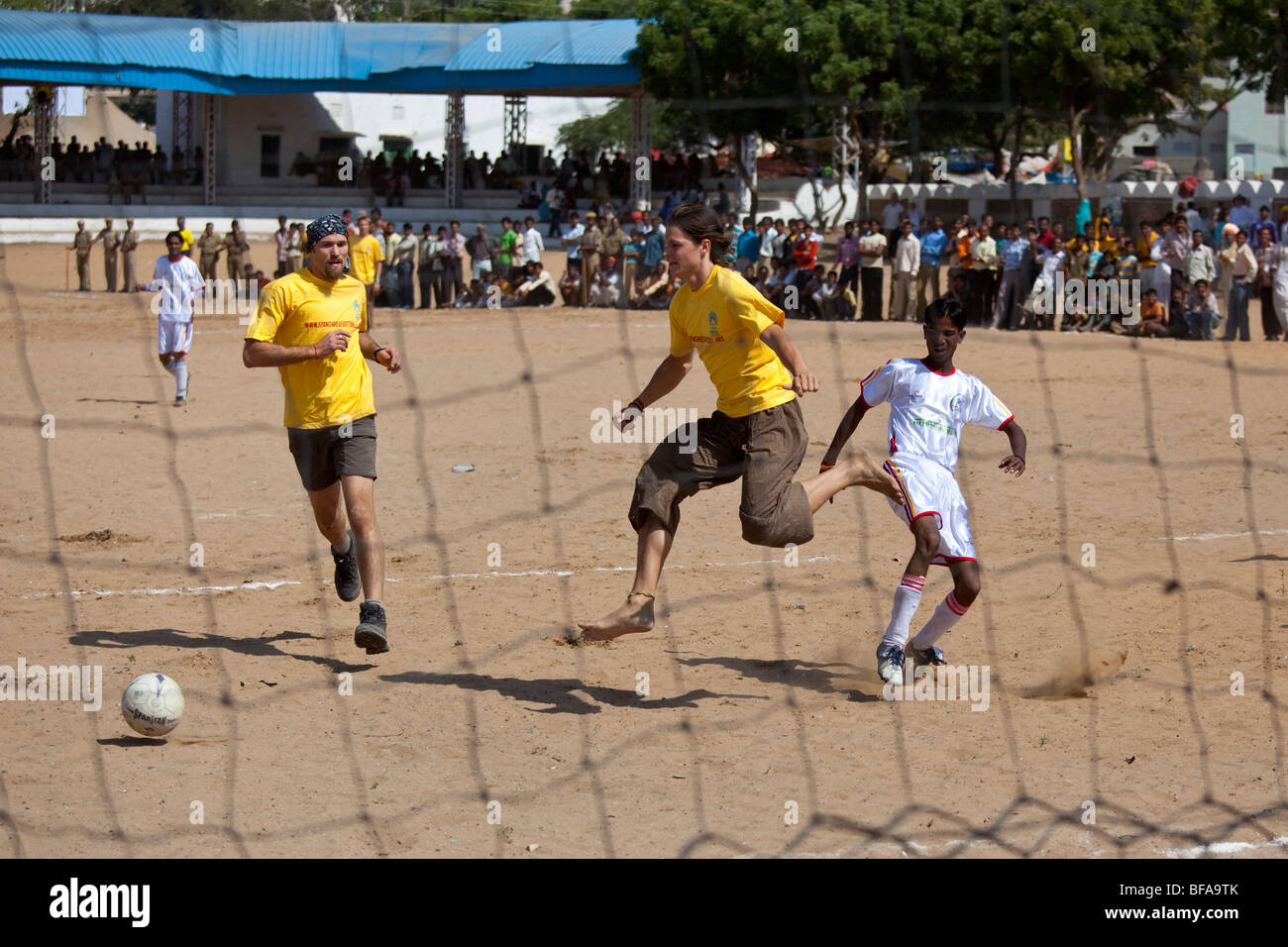 Foreigner vs the Locals Chak de Rajasthan Football Match at the Camel Fair in Pushkar India (3 to 2, visitors) Stock Photo