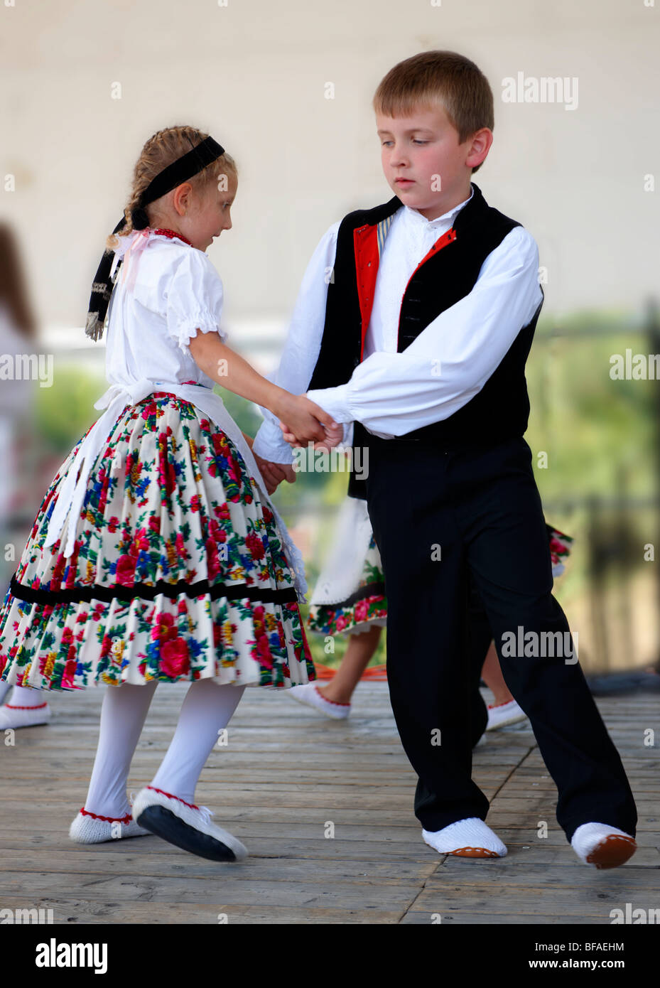 Svab Hungarian children in traditional costume at the Hajos wine festival, Hungary Stock Photo