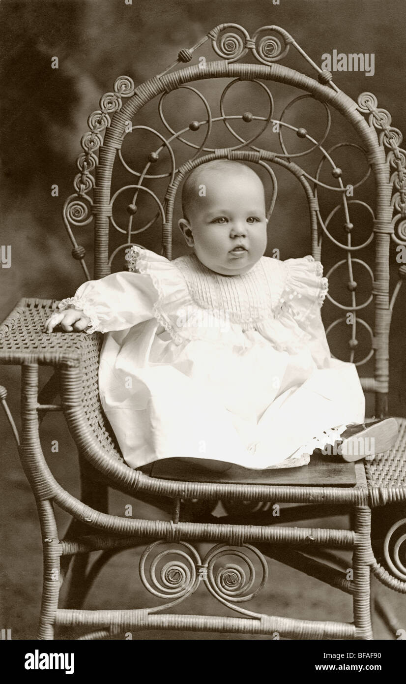 Infant in Decorative Wicker Rattan Chair Stock Photo Alamy