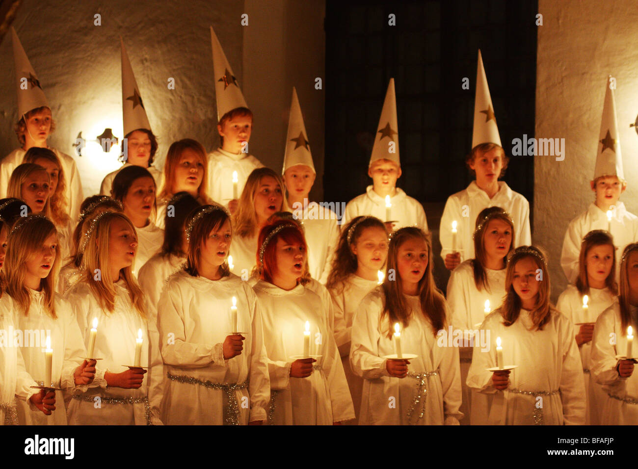 Choral group singing Saint lucia songs in a church. Stock Photo