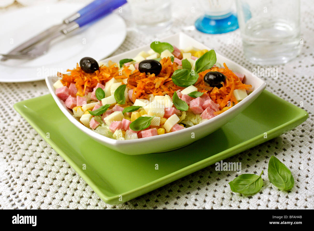 Cheese and sausage salad. Recipe available. Stock Photo