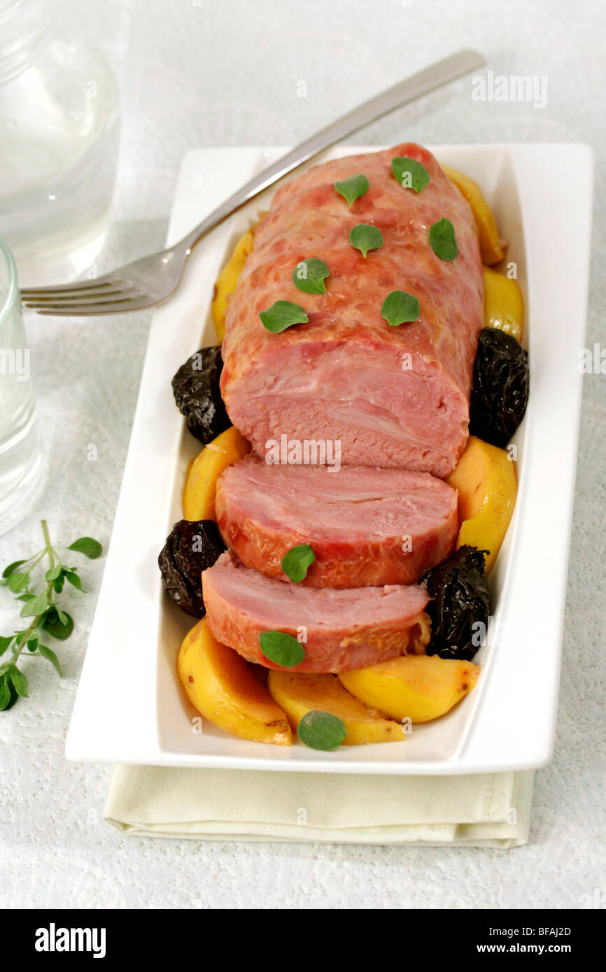 Pork knuckle with quince. Recipe available Stock Photo Alamy