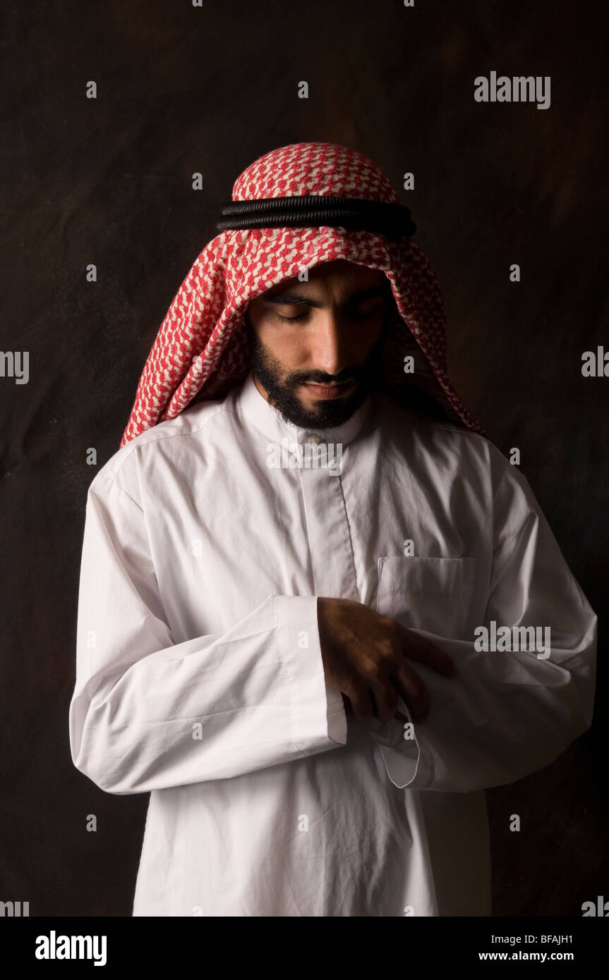 Muslim man standing praying hi-res stock photography and images - Alamy