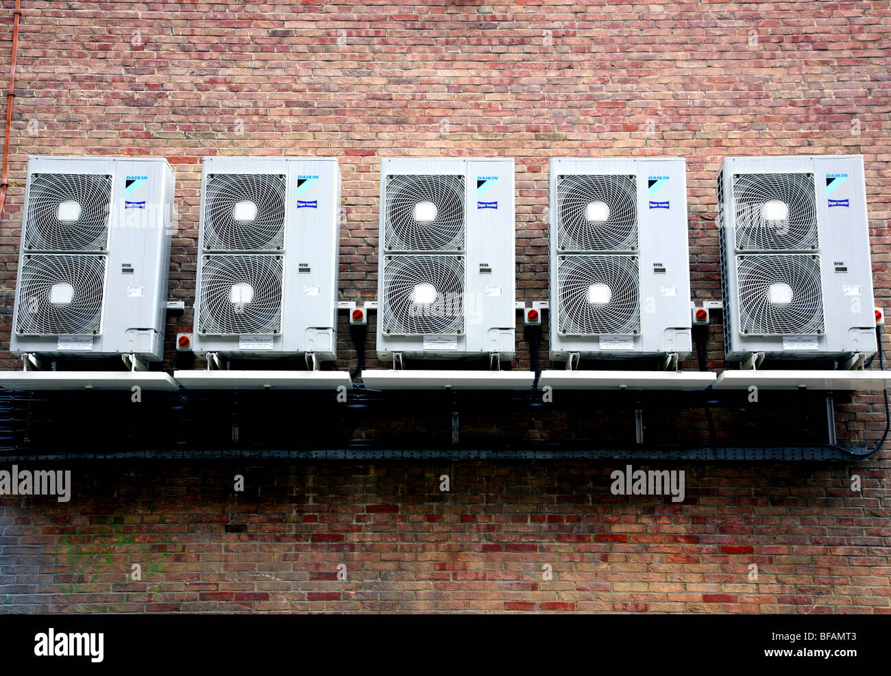 Air conditioning units on wall, central London Stock Photo