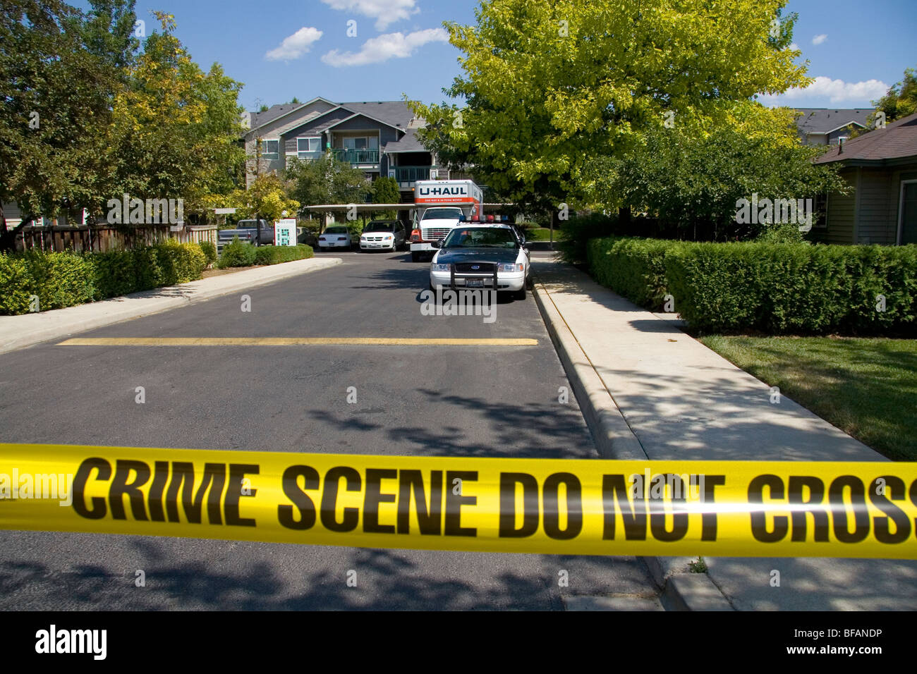 Police crime scene tape warning against entering a crime area in Boise, Idaho, USA. Stock Photo